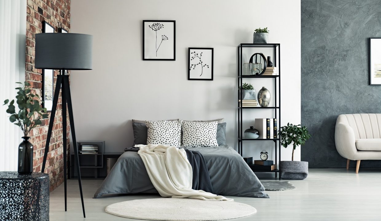 Vase,On,Metal,Table,And,Grey,Lamp,In,Spacious,Bedroom